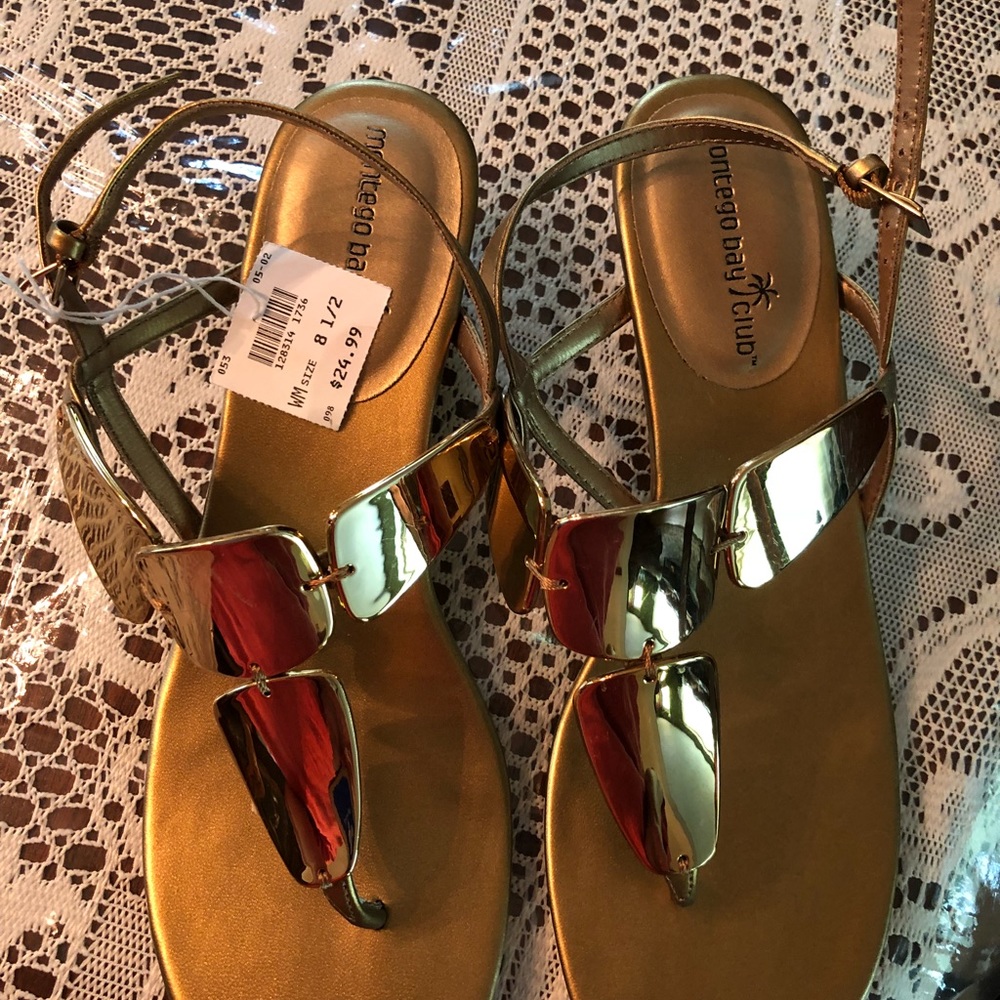 Gold sandals. Never worn. Size 8.5